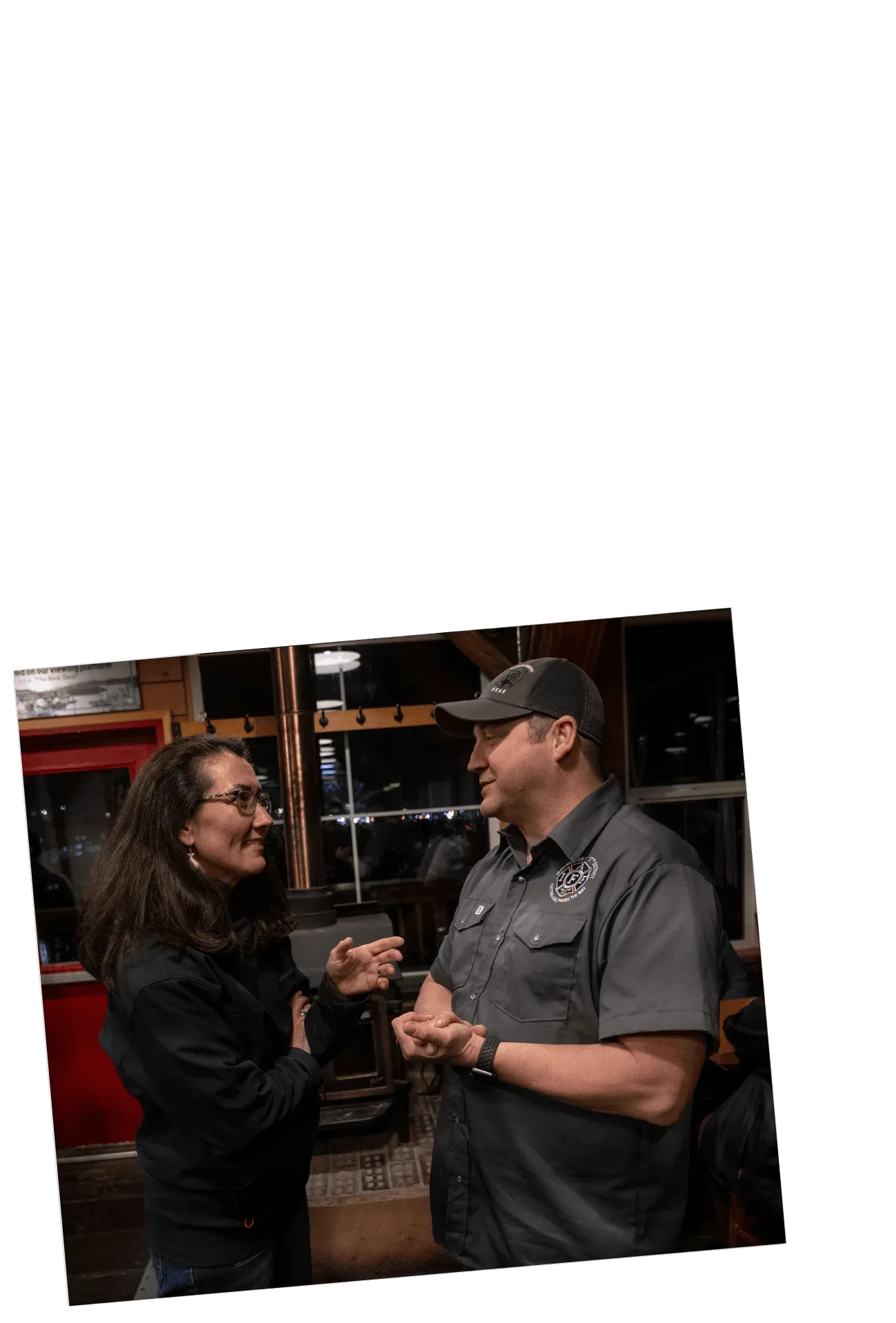 Mary Peltola talking with an Alaskan.