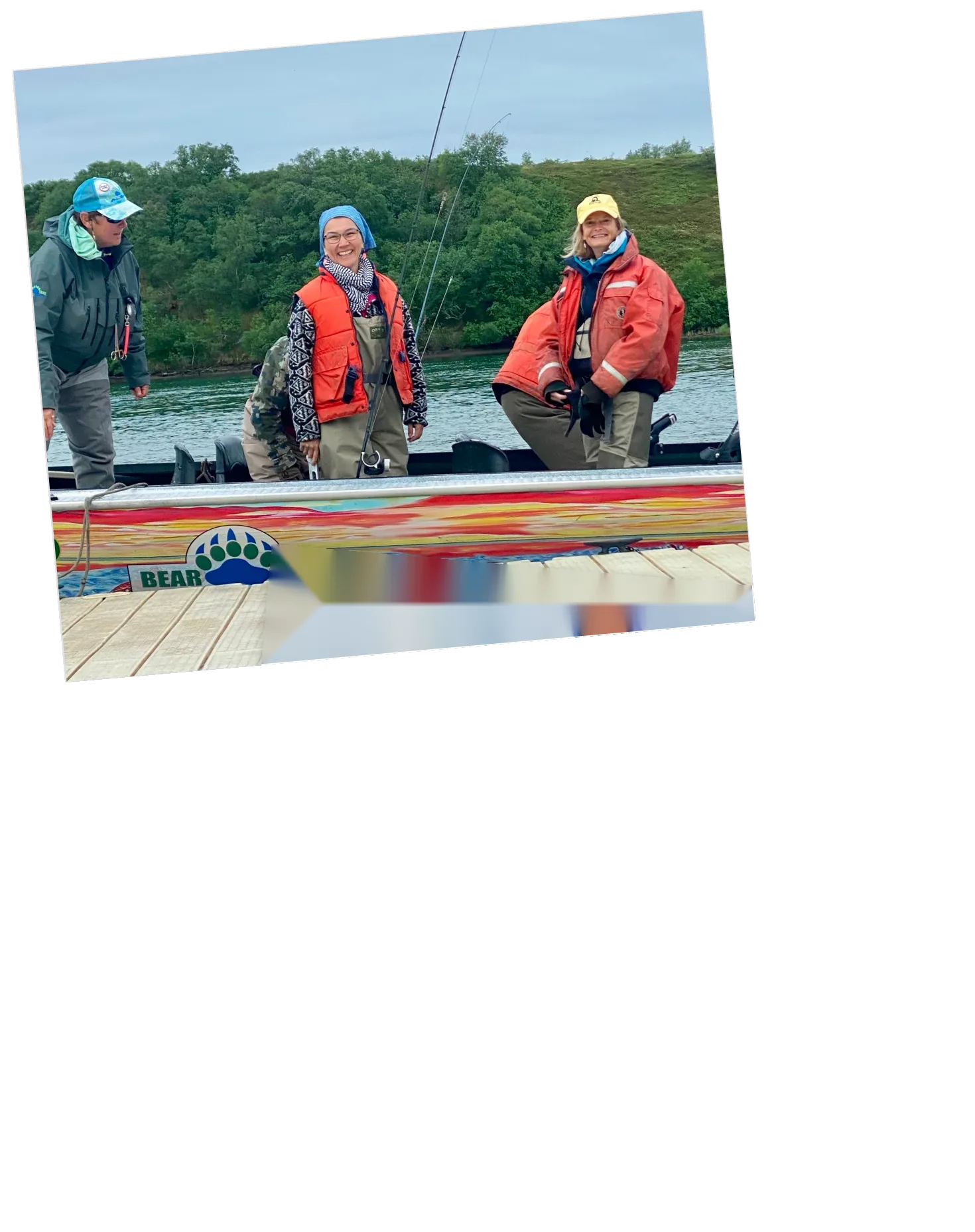 Mary Peltola with fishermen on a riverboat.