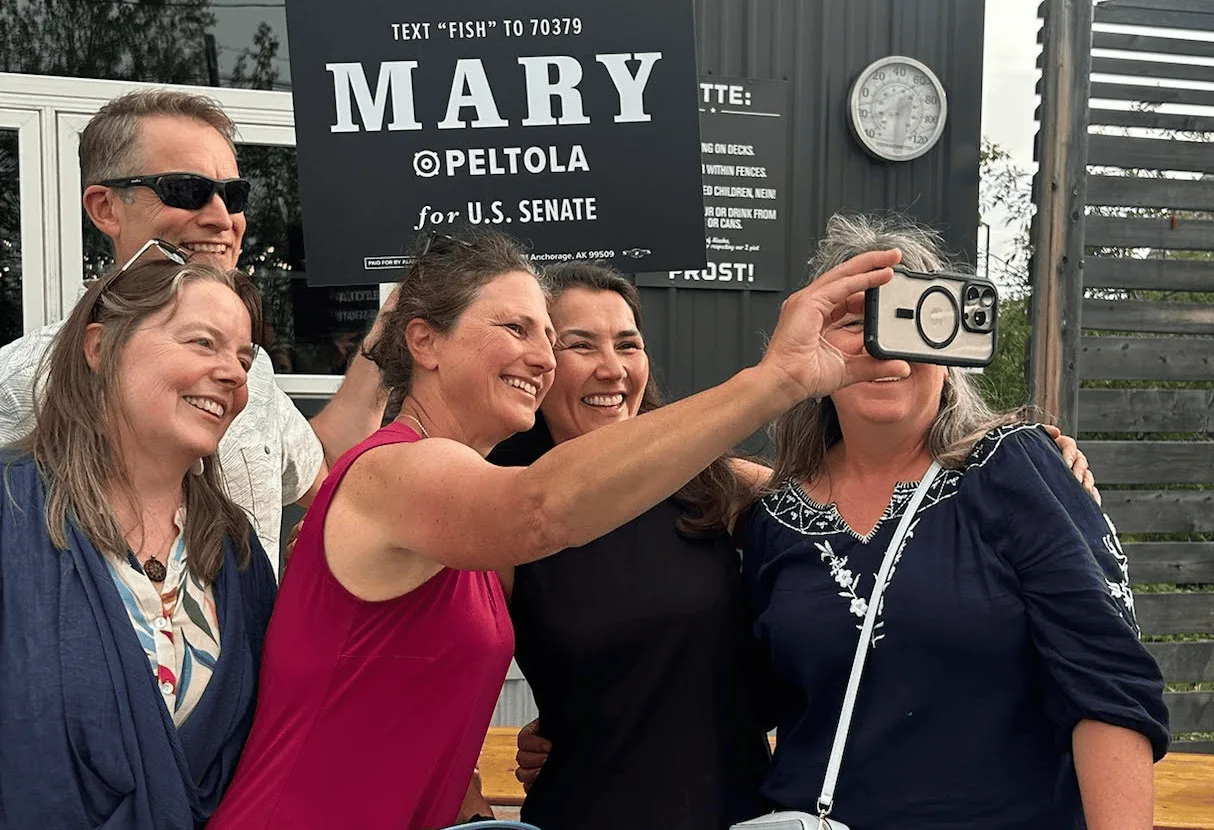Mary Peltola in a selfie with supporters in Fairbanks.