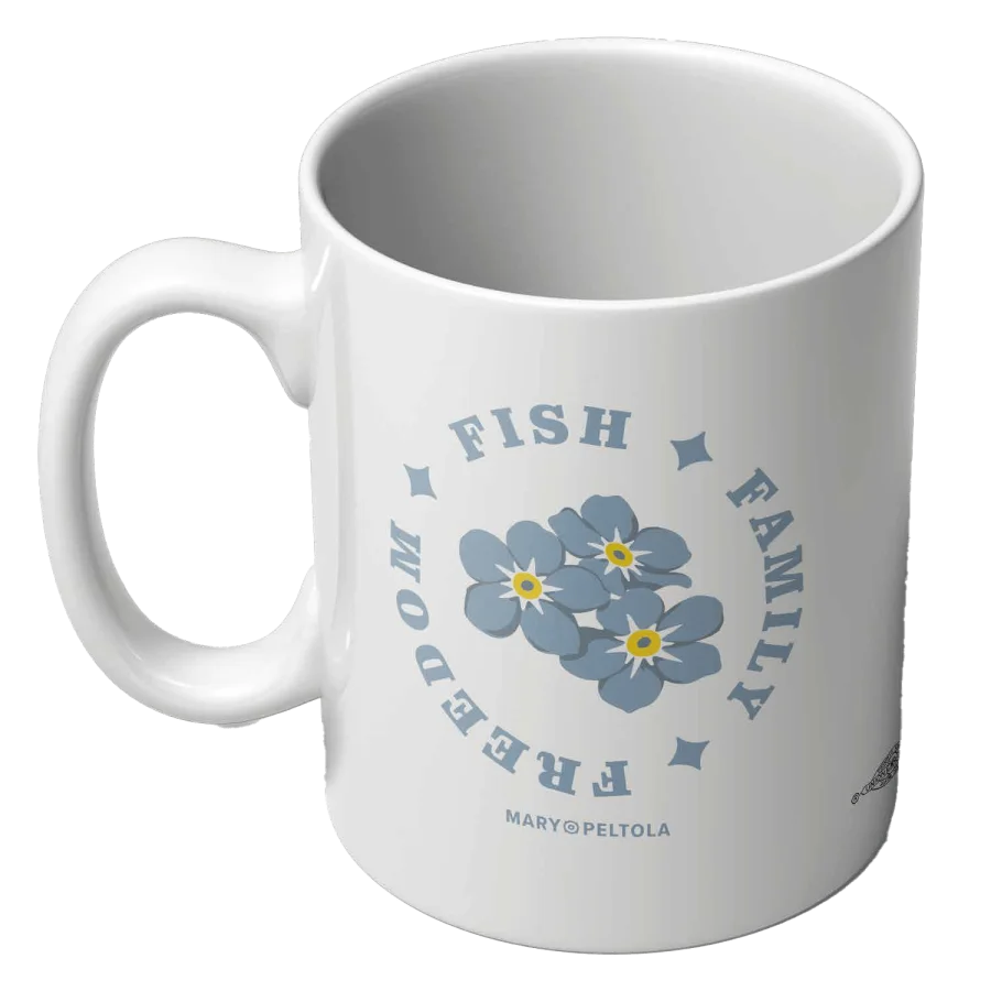 The Forget-Me-Not mug, printed with forget-me-nots and Fish, Family, Freedom.